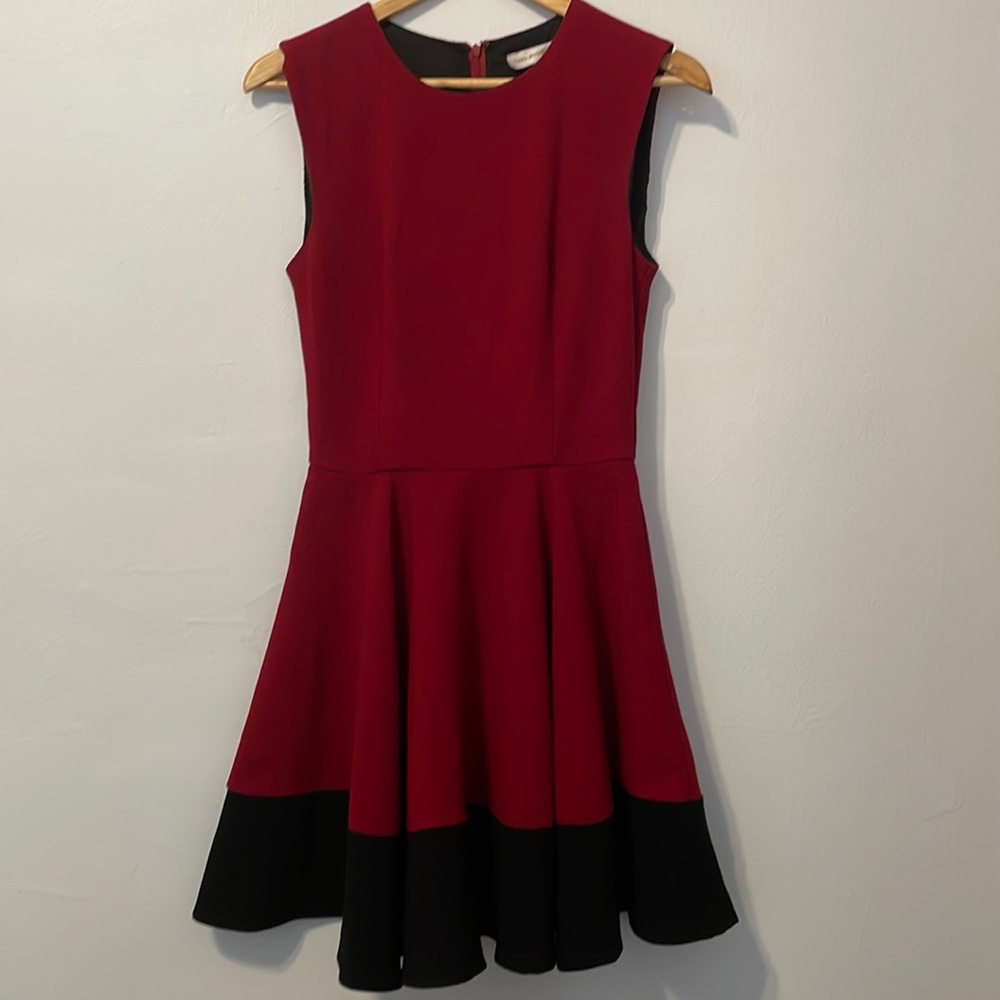 Luxe Apqothetique wine red dress with full skirt and zipper in back. Size S